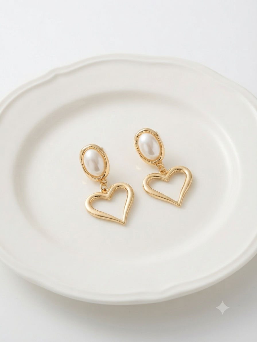 The golden pearl drop earrings