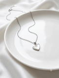 Greyish heart pendant