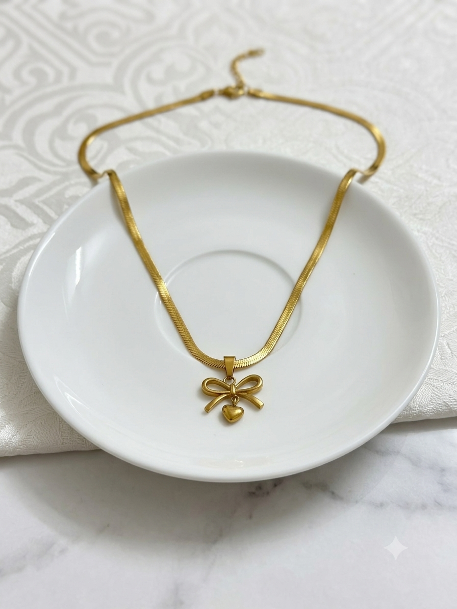 Golden Bow & Heart Herringbone pendant